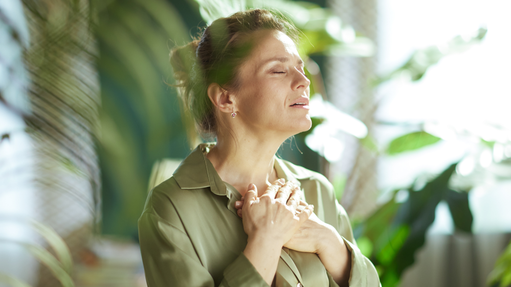 Lady regulating with breathwork